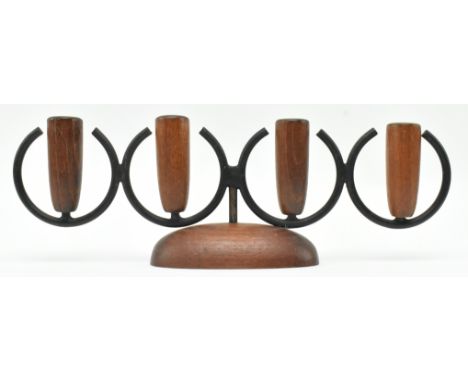 A vintage mid century circa 1970s teak and chrome Danish Luthje style quadruple centrepiece candlestick. Each candlestick hol