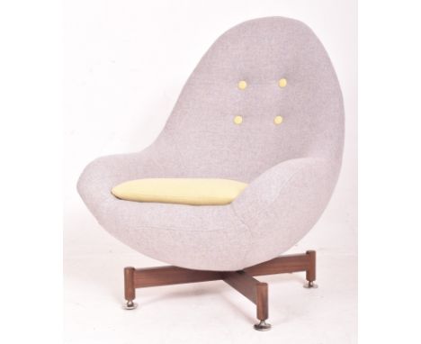 Greaves &amp; Thomas - a retro mid 20th century designer swivel egg chair / lounge chair. The chair having been reupholstered