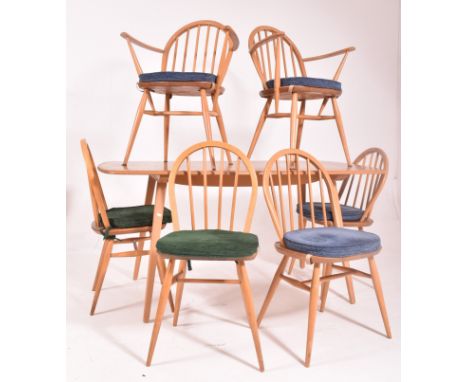 Lucian Ercolani for Ercol - a retro mid 20th century blonde beech and elm dining suite. The suite comprising of a chamfered e