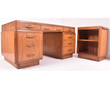An Art Deco early 20th century circa 1930s oak &amp; leather twin pedestal writing desk with matching cabinet. The lot to inc