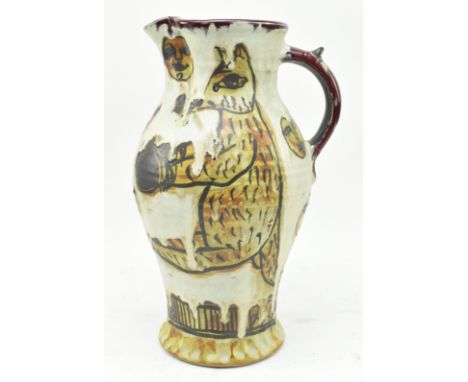 Alexandra Copeland for Dartington - a late 20th century studio pottery ceramic flower jug vase. The jug featuring grotesque s
