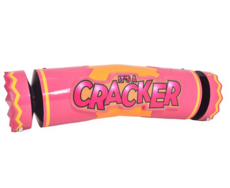 A vintage funfair / fair ground / amusement park novelty oversized lightbox decoration in the form of a Christmas cracker. Th