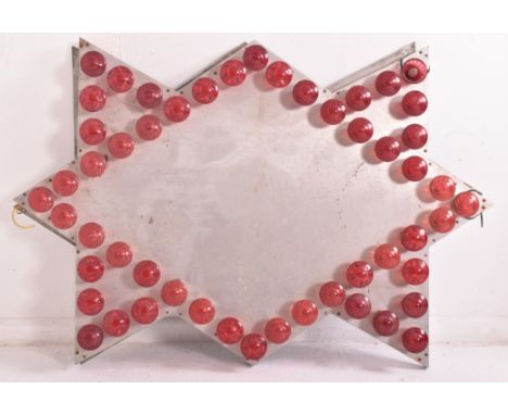 A vintage fairground / funfair / amusement park geometric light panel. The panel on steel in geometric star like shape with m