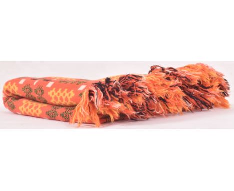 A vintage 20th century hand woollen traditional Welsh blanket. The blanket in hues of autumnal orange, yellow, cream &amp; bl