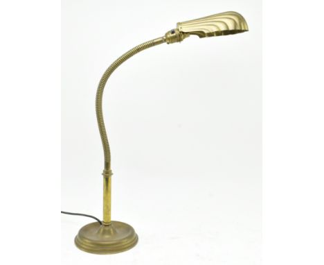 A vintage 20th century 1980s Art Deco influenced articulated brass gooseneck table / desk lamp light. The lamp having a decor