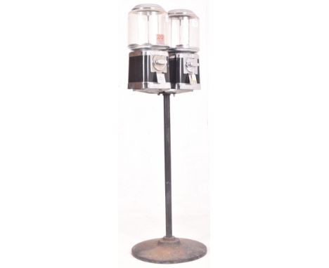 Beaver - Two vintage 20p coin operated shop front point of display black sweet shop candy vending machines on stand. Each con