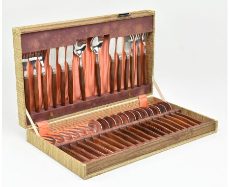 A vintage mid century circa 1970s Danish style teak cutlery canteen. The cased set with thirty-two pieces comprising forks, k