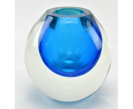 A vintage mid century heavy cased glass vase in the style of Murano Sommerso. The vase with central sky blue bulbous form cas