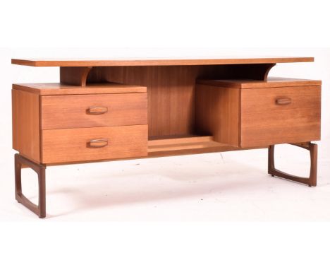 R. Bennett for G Plan - Quadrille Range - a retro 1960s teak wood writing table desk / dressing table. The desk having a floa