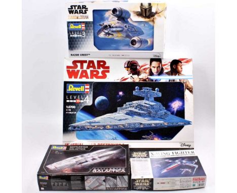 A collection of four Star Wars and Battlestar Galactica boxed model kits, comprising a Revell 1/27th scale Imperial Star Dest