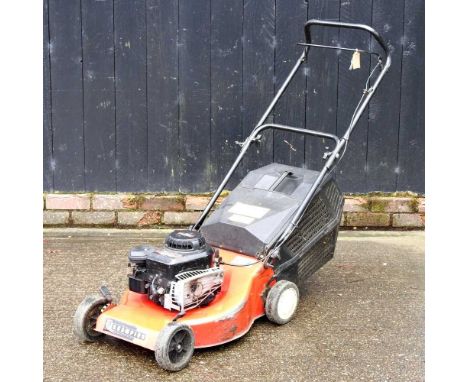 A Champion rotary petrol lawnmower