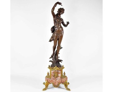 A 19th century style French bronze statue of a lady, on a marble base, 63cm high
