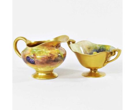 A Royal Worcester cream jug, painted with fruit by Price, printed marks and date code for 1926, together with a Worcester dis