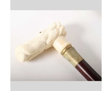 A novelty walking stick, 20th century, having a carved bone handle in the form of a snake, 90cm high overall