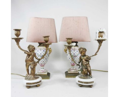 A pair of Sevres style porcelain table lamps and shades, 43cm high, together with a pair of continental style gilt cherub twi