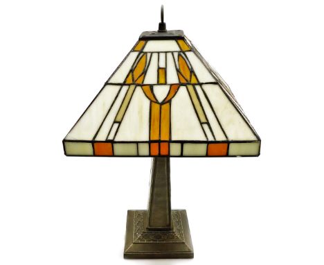 A modern Tiffany style table lamp, with square cream and orange shade, 47cm high.