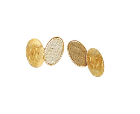 A pair of 9ct gold cufflinks, with oval design, one side engine turned the other bearing the initials DB, makers stamp D&amp;