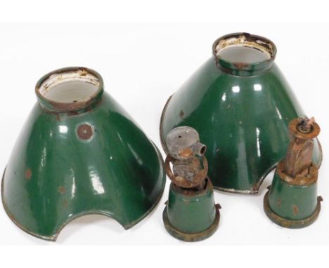 Two industrial light shades, each of domed design with green painted finish on hanging clasp, 50cm wide.