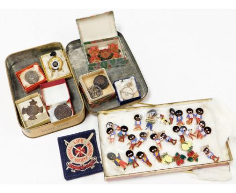 A group of advertising badges and medallions, comprising Golden Shred Golly enamel badges, Swimming association badges, etc. 