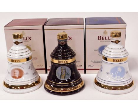 Three Bells Scotch Whisky decanters, Christmas 2001 decanter, Christmas 2000 decanter and 2002 decanter, boxed.  (3)