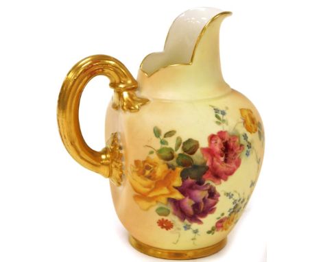 A Royal Worcester blush ivory milk jug, with decoration of pink yellow and blue pansies, with a shaped spout, and gilt handle