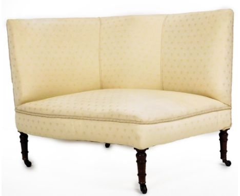 An unusual Victorian mahogany seat or chair, upholstered in cream patterned fabric, on turned legs with castors, constructed 