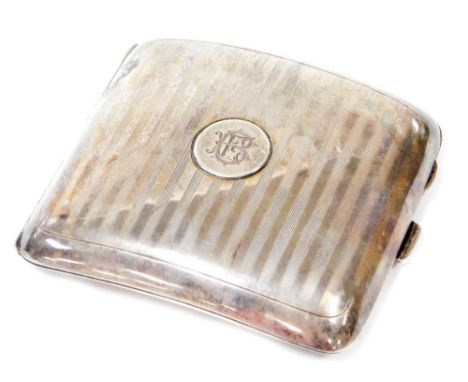 A George V silver cigarette case, of engine turned decoration on curved base with central cartouche bearing the initials BE, 