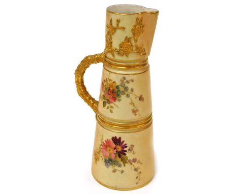 A Royal Worcester blush ivory jug, decorated with sprays of flowers, and a gilt handle, with purple Royal Worcester stamped u