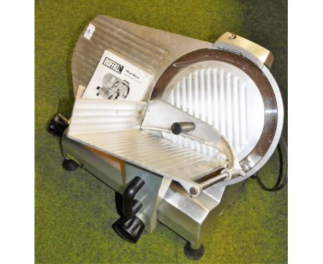 A Buffalo meat slicer, with instruction manual.