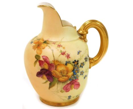 A Royal Worcester blush ivory milk jug, with decoration of pink yellow and blue pansies, with a shaped spout, and gilt handle