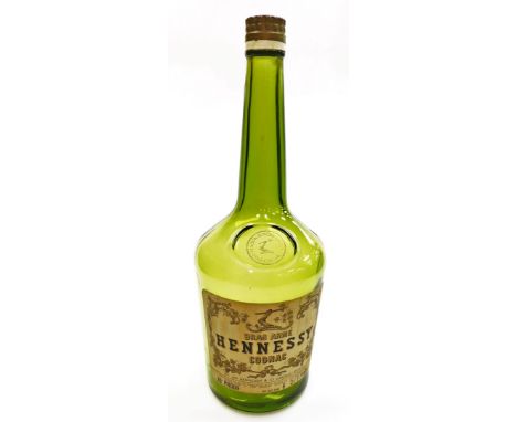 A large advertising Hennessy cognac wine bottle, empty, 45cm high. 