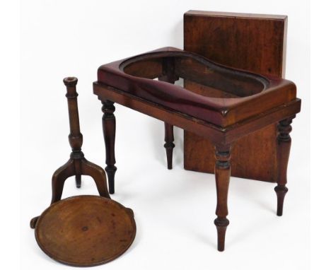 A 19thC mahogany bidet, the rectangular removable cover enclosing a vacant interior, on turned legs, 46cm high,56cm wide, 33c