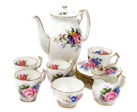 An Aynsley part tea service, in floral pattern with roses and other flowers, comprising tea pot, milk jug, sugar bowl, four t