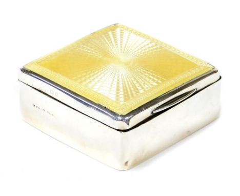 A George V silver and enamel cigarette box, the rectangular top with yellow enamelled decoration, lift up lid to a blue ename