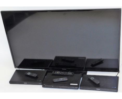 A Panasonic 49" flat screen television, with various accessories, the television with power lead, remote control and operatin