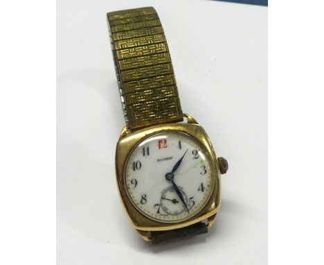 A traditional gents gold cased wrist watch, the enamel dial inscribed 'Sunray' with 'red twelve'.