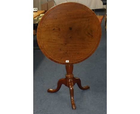 A Georgian mahogany tip up top tripod table