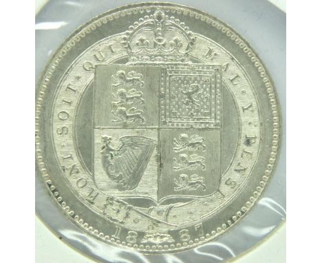 1887 Queen Victoria shilling, uncirculated. P&amp;P Group 1 (£14+VAT for the first lot and £1+VAT for subsequent lots) 