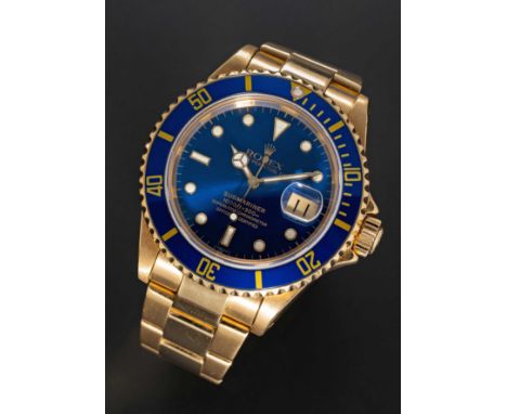 A RARE GENTLEMAN'S 18K SOLID YELLOW GOLD ROLEX OYSTER PERPETUAL DATE SUBMARINER BRACELET WATCHCIRCA 1998, REF. 16618 WITH "SW