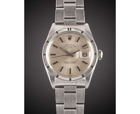 A GENTLEMAN'S STAINLESS STEEL ROLEX OYSTER PERPETUAL DATE BRACELET WATCHCIRCA 1974, REF. 1501 WITH SILVER DIALMovement: 26J, 