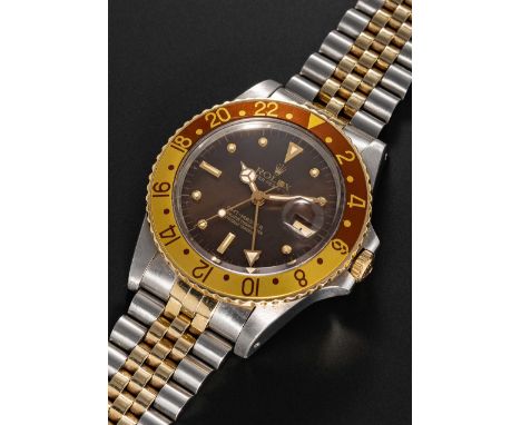 A GENTLEMAN'S STEEL & GOLD ROLEX OYSTER PERPETUAL GMT MASTER "ROOT BEER" BRACELET WATCHCIRCA 1984, REF. 16753 WITH "TIGER'S E