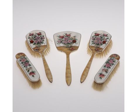 each piece decorated with enamel and floral designs, contained in a fitted case (unassociated) , by Henry Clifford Davis, Bir
