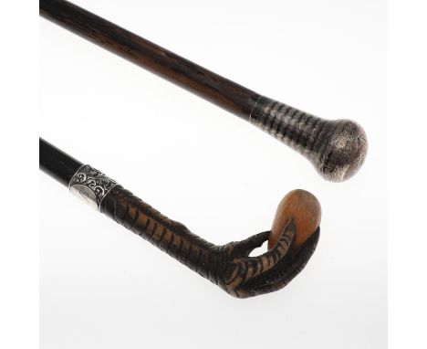 the mount with engine-turned decoration, by Henry Perkins & Sons, London 1903, together with another mounted walking cane, th