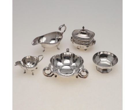 a George V lobed dish with three scroll handles, a sauce boat with a gadrooned border, a tea caddy with twin lion-mask loop h