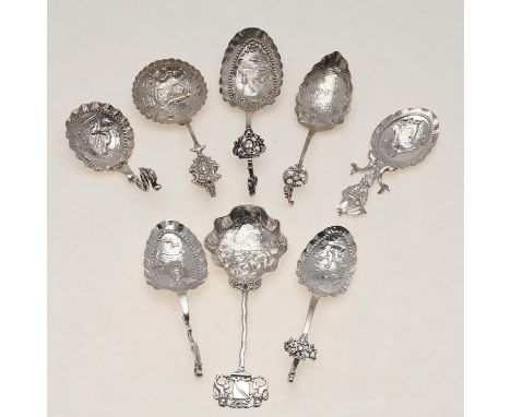seven caddy spoons and one sifter, in varying designs, mixed makers and dates; the largest 6.1" (15.5cm) long; 8oz (8). ** Mi