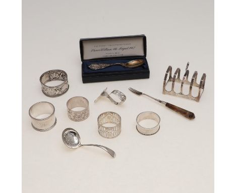 including a cased reproduction of "THE ROYAL CHRISTENING SPOON", five napkin rings (one unmarked & all initialled/ inscribed)