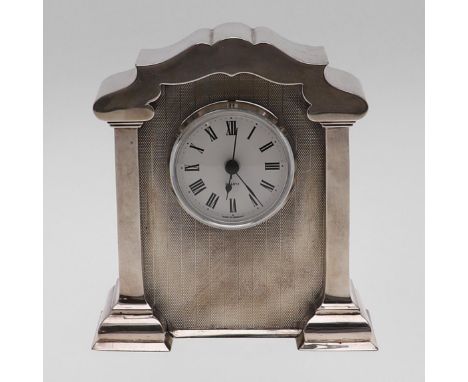 with engine-turned decoration and a later-fitted movement, by William Base & Sons, Birmingham 1924; 6.2" (15.6cm) high. ** Qu