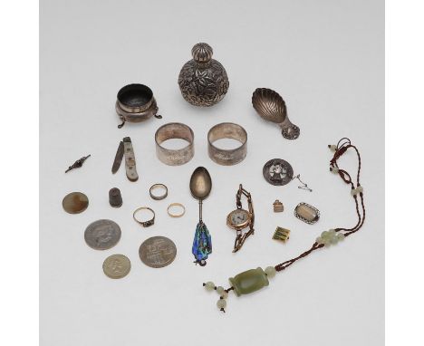two napkin rings, two gold rings, three brooches (one Scottish), a folding fruit knife, a caddy spoon, a scent bottle, an ena