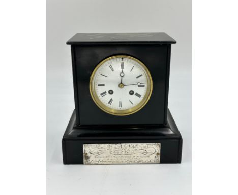 A black marble mantle clock with movement marked 'Japy Fils depos 1855 medailler 1844 1840' and numbered 2491. A white metal 