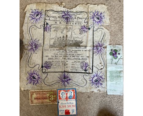 A memorial paper napkin commemorating the loss of life on the sinking of the SS Titanic, approximately 36cm x 36cm together w